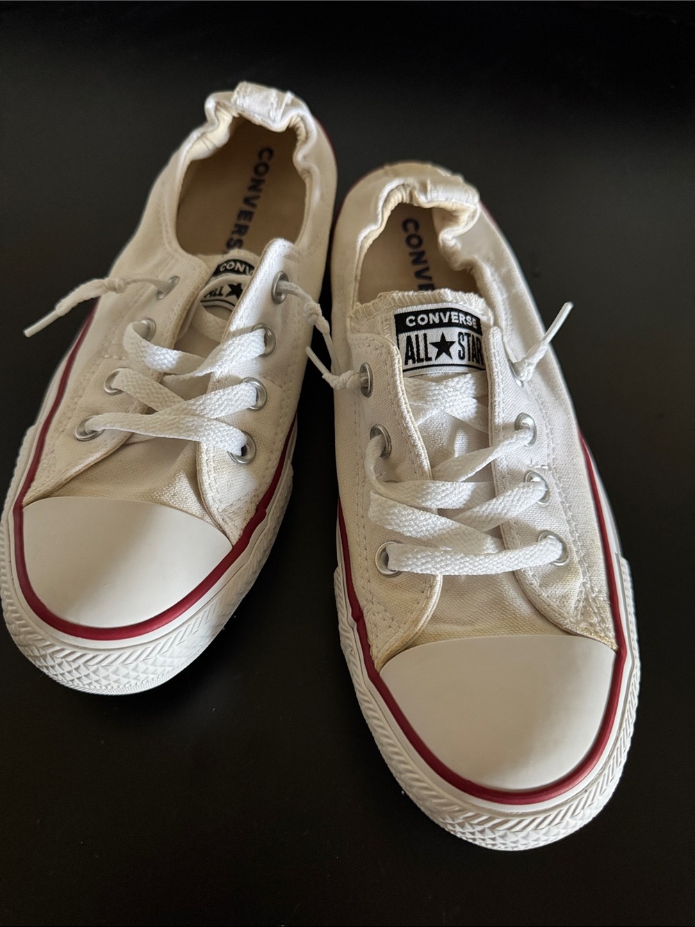 Converse White Low-Top Slip-On Style Sneakers with Red Trim